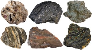 Varieties of schistose metamorphic rocks: 1. Mica schist with porphyroblasts of garnet, staurolite and kyanite. 2. Graphite schist. 3. Chlorite schist (greenschist). 4. Quartzofeldspathic (gneissic) schist. 5. Staurolite schist with a twinned staurolite porphyroblast. 6. Blueschist (glaucophane schist with garnet and omphacite).